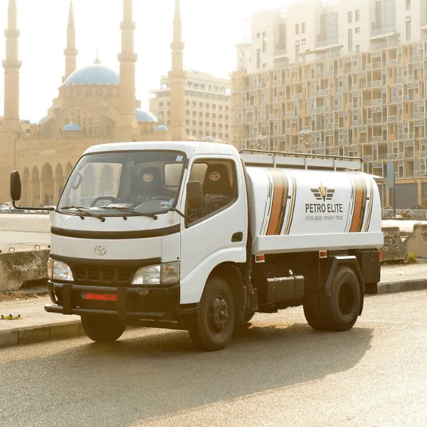 A Petro Elite tanker truck in front of a landmark mosque in downtown Beirut at golden hour